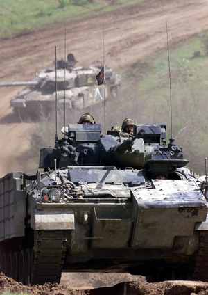 Image from the MOD licenced under the Open Government Licence http://www.nationalarchives.gov.uk/doc/open-government-licence/version/2/ British Army Warrior and Challenger Tanks on exercise